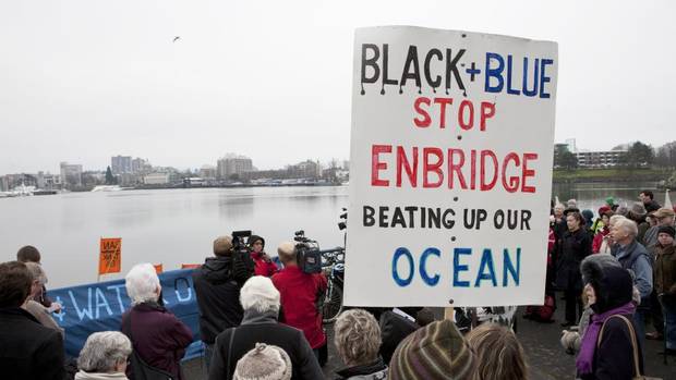 A demonstration outside the Delta Ocean Pointe hotel in Victoria. (DUANE PRENTICE FOR THE GLOBE AND MAIL)